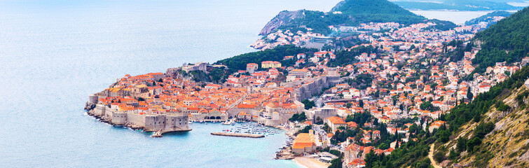 Fototapeta premium View from above and distance of Dubrovnik old city and surrounding sea and islands