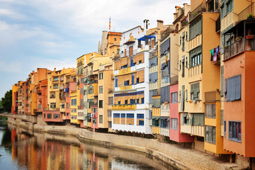 Fototapeta na wymiar Picturesque buildings along the river in Girona, Catalonia