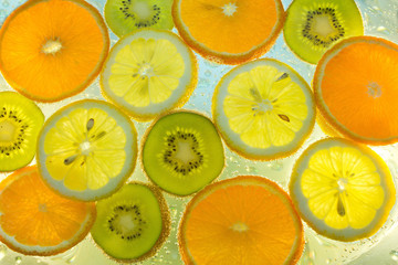 Fototapeta na wymiar Background of fruit in water with bubbles