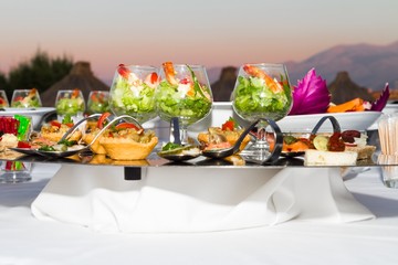 Buffet reception shrimp coctail serving.
