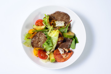 salad with meat,egg, tomatoes, olives and vegetables