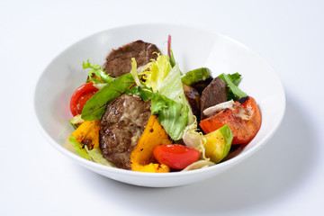 salad with meat,egg, tomatoes, olives and vegetables