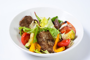 salad with meat,egg, tomatoes, olives and vegetables