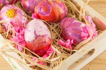 Decorated Easter eggs in a box