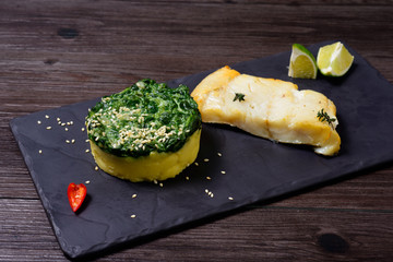 raw fish filet with herb and spices