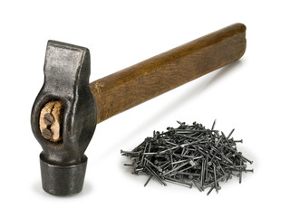 Old hammer and heap of nails