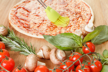 Cooking pizza with fresh vegetables. Food ingredients close up