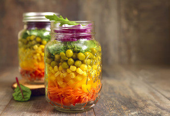 Fresh vegtable salad in a mason jar.