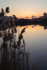 Beautiful cityscape sunset on the lake