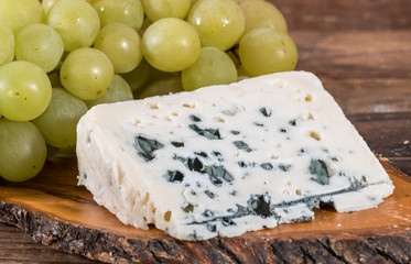 French roquefort cheese with white grapes