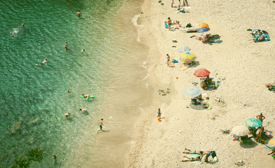 Beach holiday concept. Top view of beach. Vintage photo
