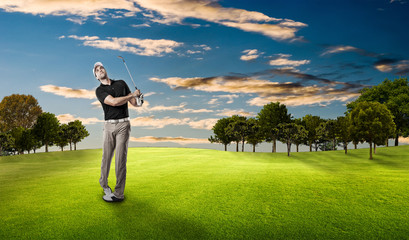 Golf Player using a black uniform.