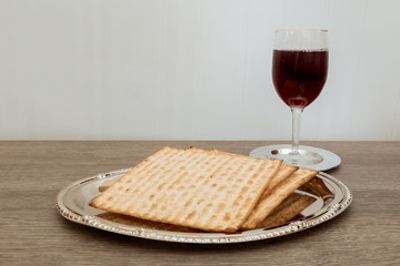 Still-life with wine and matzoh jewish passover bread