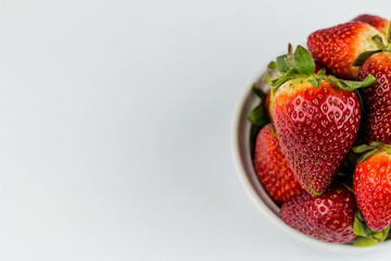 Half of strawberry isolated on white background