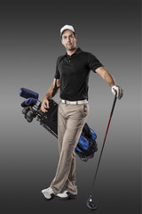 Fototapeta na wymiar Golf Player using a black uniform.