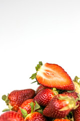 Half of strawberry isolated on white background