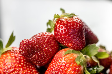 Half of strawberry isolated on white background
