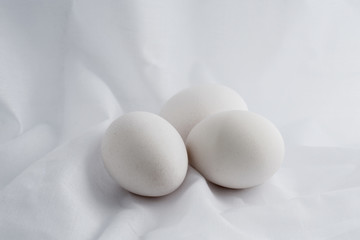 white eggs on vintage background.