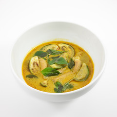 The delicious homemade Thai green curry with pork (Gang Keaw Wan) in white bowl.