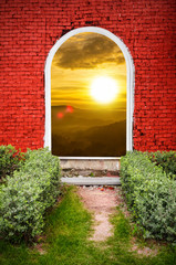 Red brick gate sunset on the mountain