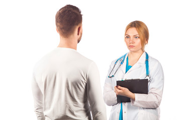 Fototapeta premium Female doctor holding application form while consulting patient.