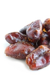 Dried Pitted Dates on White Background