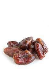 Dried Pitted Dates on White Background