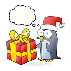 thought bubble cartoon christmas penguin with present