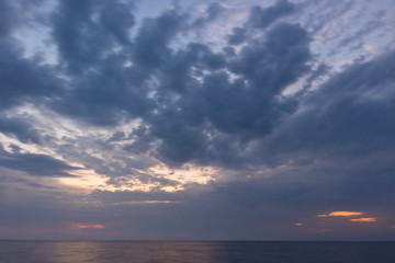 Beautiful sunrise with dramatic sky over Black sea, Crimea
