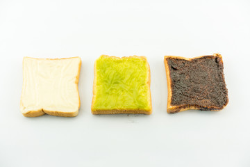 3 principle flavoured of bread : milk flavored cream spread bread slices and Sliced chocolate bread and Sliced thai custart bread isolate on white - copy space
