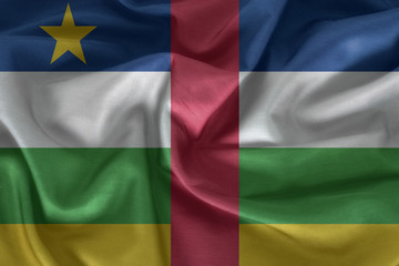 Obraz premium Central African Republic flag pattern on the fabric texture
