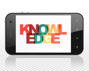 Learning concept: Smartphone with Knowledge on  display