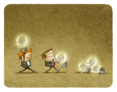 Two men holding lighted bulbs