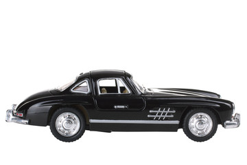 beautiful vintage toy machine in black color isolated on white background