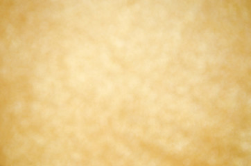 abstract defocused blurred gold background.