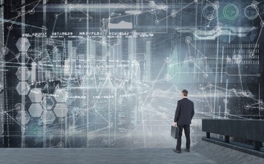 Composite image of businessman looking away 