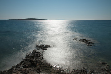Rocky coast after  sunrise in the summer morning in Croatia