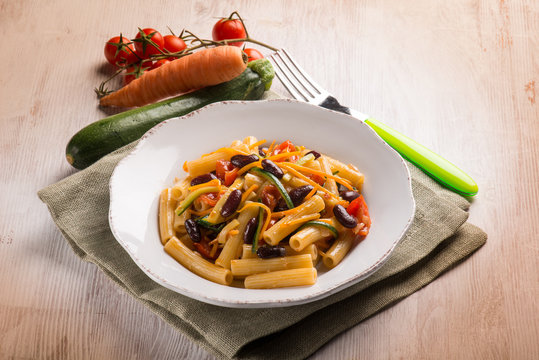 pasta with beans carrot zucchinis and fresh tomatoes