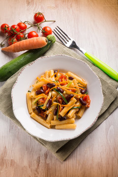 pasta with beans carrot zucchinis and fresh tomatoes