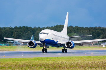 Airplane landing on runway. Touchdown with tire smoke