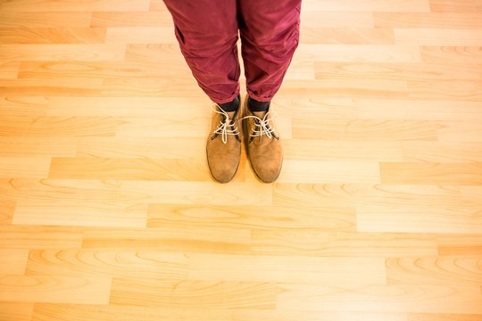 Above View Of A Man With Yellow Shoes