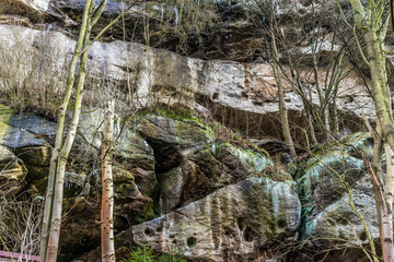 Sandstone rocks in Sudeten mountains in Saxony, Germany, surrounded by forest