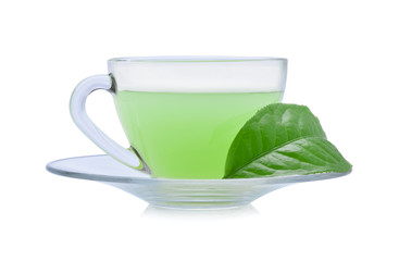 glass cup of green tea isolated on white background