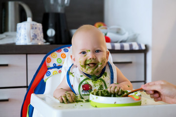Feeding. Baby's first solid food