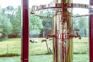 Fototapeta na wymiar Copper taps/faucets at a water source