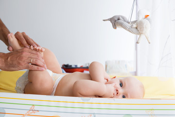 Father gently care of baby