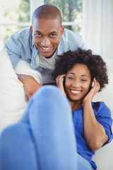 Fototapeta premium Portrait of smiling couple in the living room