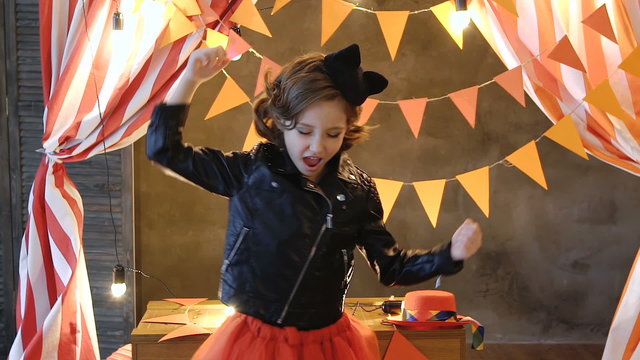 An almost crazy girl, dancing with her hair and feeling much happiness and freedom of movements. 