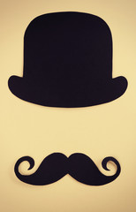 Photo booth props bowler, mustache on beige background
