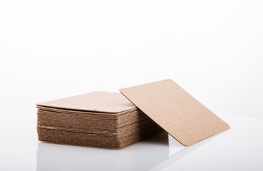 Stack of blank business card on white background.